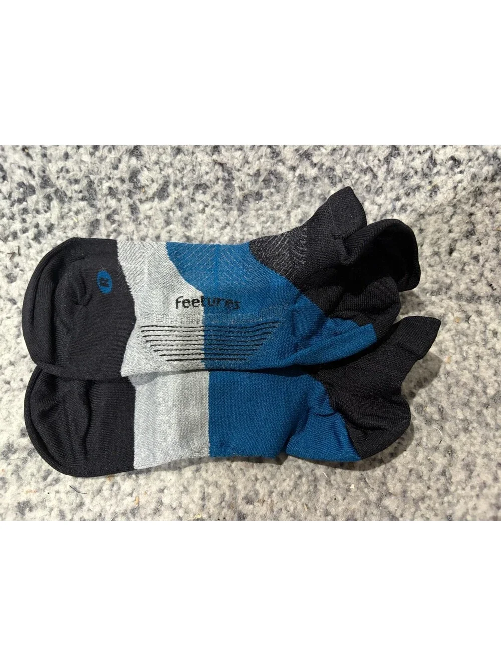 (1) Pair Feetures Elite Ultra Light Cushion No Show Tab Socks Black Sea Sz Large